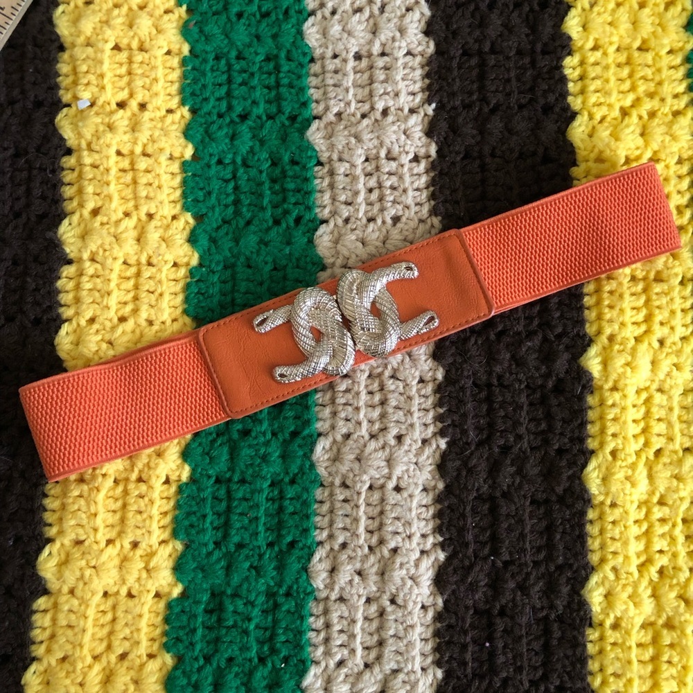 vtg unbranded orange elastic belt best fits L-XL